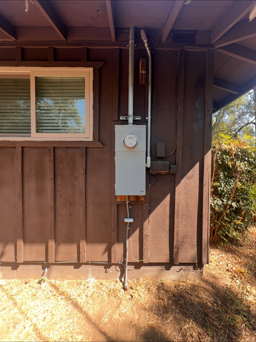 Newly installed 200-amp meter main panel on the exterior of a Sacramento-area home